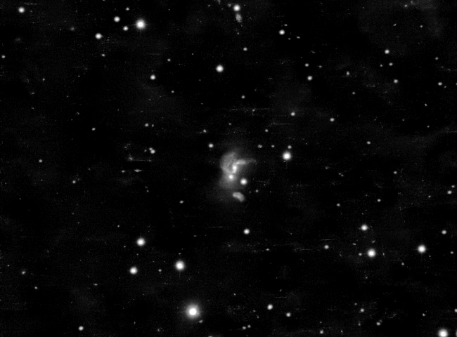 Arp 111 – ein kleines Trio wechselwirkender Galaxien